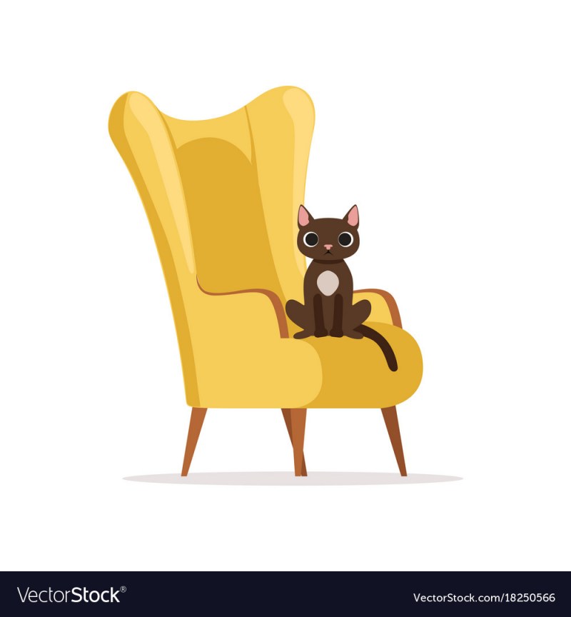 Кошка на спинке кресла