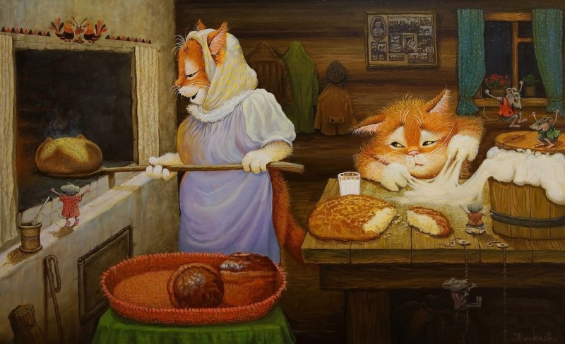 Кот лежит на табуретке